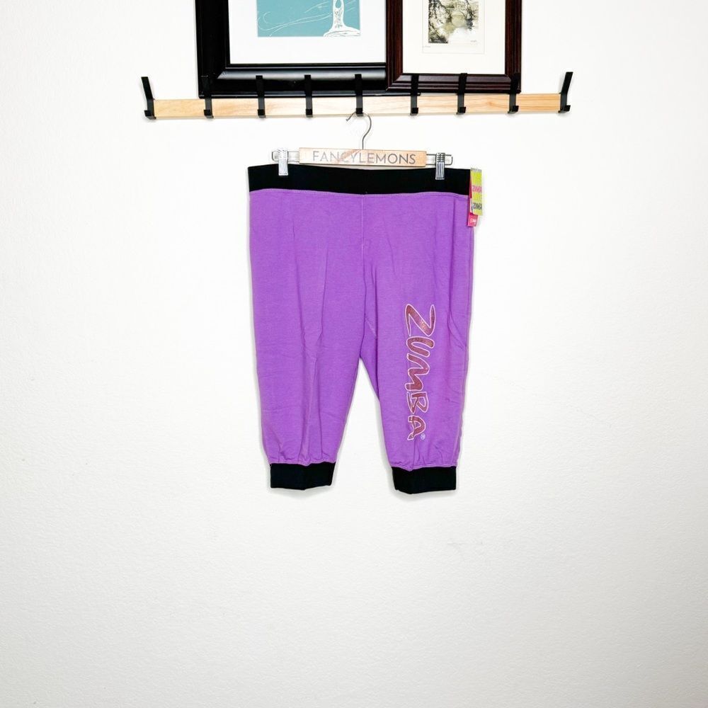 Zumba NWT! Shake Your Shuttle Capri Pants Orchid Purple Black Waistband Size L